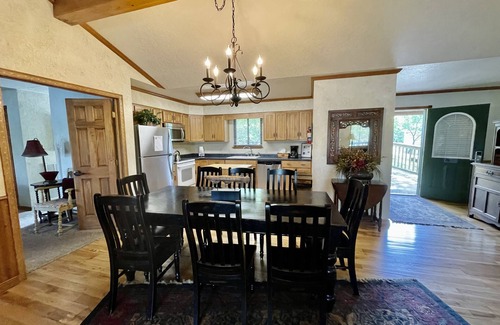 Mount Ida Cottage | Lake view three bedroom, three bath log-sided cottage with private hot tub overlooking Lake Ouachita. by RedAwning