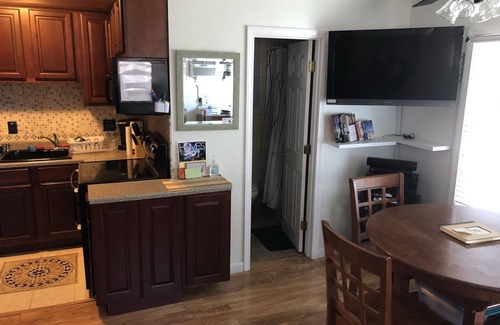 Laconia Cottage | Lake Winnipesaukee cottage with dock, large deck & view of Paugus Bay in Laconia