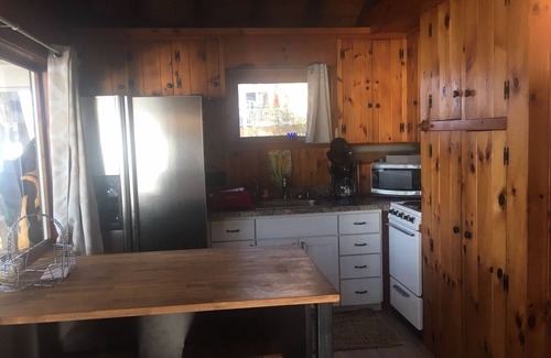 Meredith House | Lake Winnipesaukee lakefront cottage with private coveand 300' of lake frontline