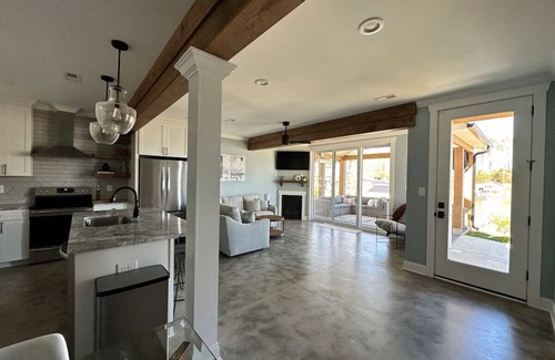 Southmont House | Lakefront 2 BR Cottage sleeps 6 with private dock, kayaks, and heated patio