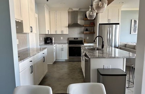 Southmont House | Lakefront 2 BR Cottage sleeps 6 with private dock, kayaks, and heated patio