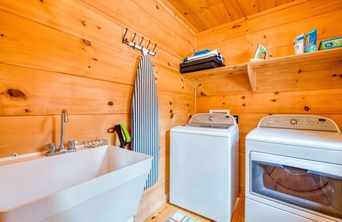Mills River Cabin | Lakefront cabin & tiny home with a firepit, wet bar, washer/dryer, dock