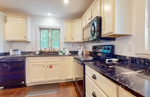 Dandridge Cabin | Lakefront Cabin with private dock, kayaks, fire pit, New hot tub, and cigar room