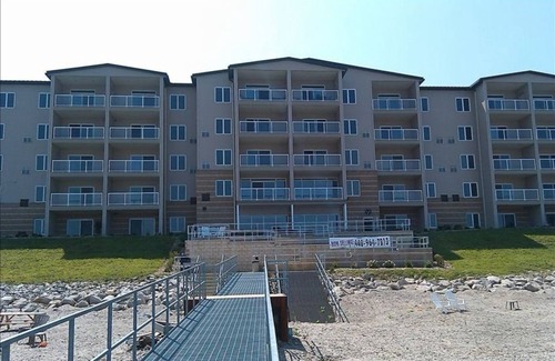 Geneva-on-the-Lake House | Lakefront condo -2BR/2Bath Sleeps 4 Private beach and lake front balcony