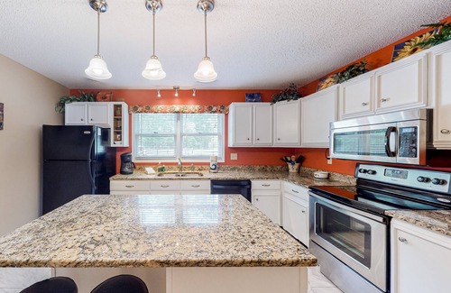 Leesville House | Lakefront dream with serene view, private dock, foosball, firepit - dog-friendly