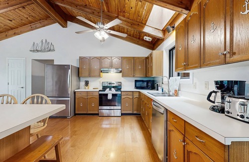 Blue Water House | Lakefront Escape with Private Docks, Three-Season Room, and Spacious Bunk Room