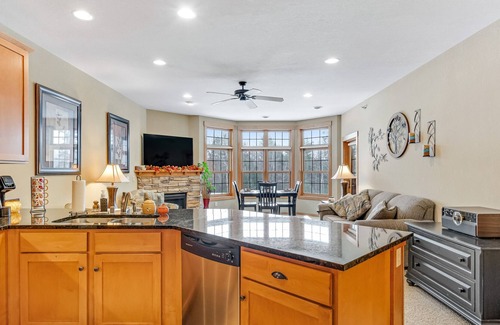 Three Lakes Condo | Lakefront ground-floor condo with balcony, fireplace, W/D, pool & hot tubs
