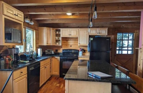 Lake Clear Cabin | Lakefront Home and Boathouse on Lake Clear