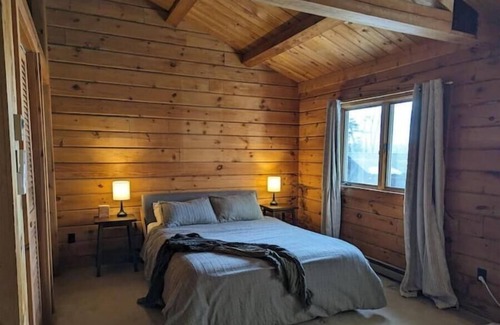 Lake Clear Cabin | Lakefront Home and Boathouse on Lake Clear