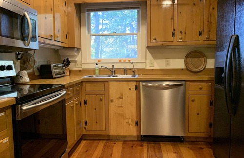 Lakemont House | Lakefront home on Lake Rabun with huge boathouse and lots of patio space.