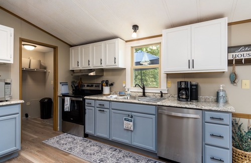 Piney Flats House | Lakefront home, peaceful setting, beautiful views of the lake and floating dock.