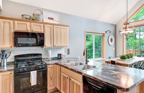 Presque Isle House | Lakefront home w/furnished deck, firepit & private dock - dogs OK