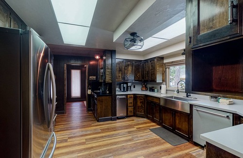 Bass Lake House | Lakefront home w/private boat dock, hot tub, gas grill, buoy, & wood fireplace