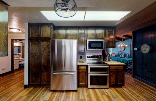 Bass Lake House | Lakefront home w/private boat dock, hot tub, gas grill, buoy, & wood fireplace