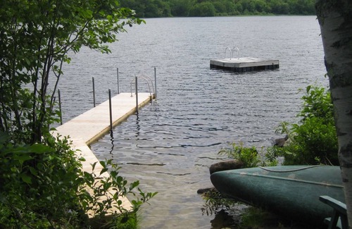 Moultonborough Cabin | Lakefront home with private dock, swim raft, pool table, kayak, canoe, & W/D