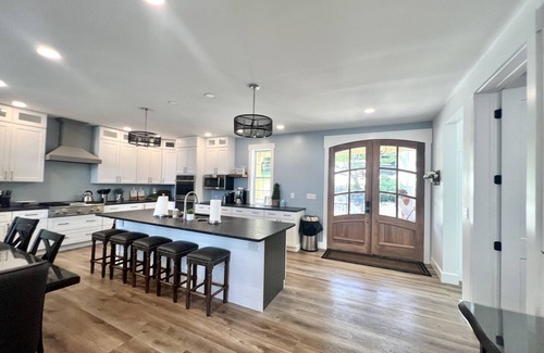 Andersonville House | Lakefront Home with Dock & INDOOR Pool & KING BEDS! Great parking options!