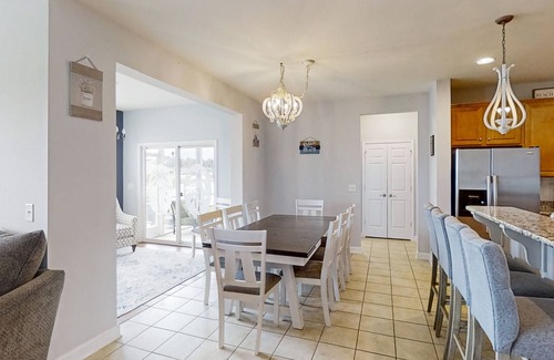Forestbrook House | Lakefront home with enclosed yard, W/D, central AC & pool