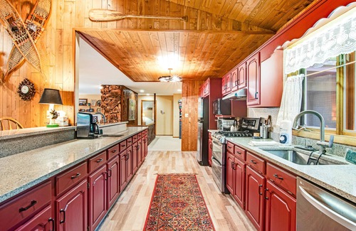 Minocqua House | Lakefront home with a private dock, firepit, fast WiFi, washer/dryer, central AC