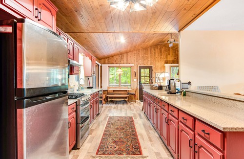 Minocqua House | Lakefront home with a private dock, firepit, fast WiFi, washer/dryer, central AC