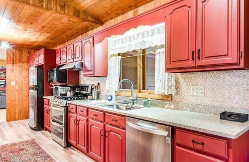 Minocqua House | Lakefront home with a private dock, firepit, fast WiFi, washer/dryer, central AC