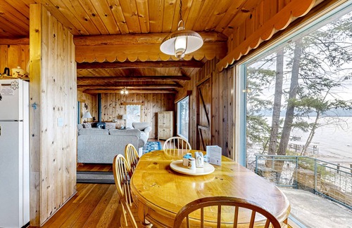 Lakeside Cabin | Lakefront home with amazing mountain views, wraparound deck, fireplace, & grill