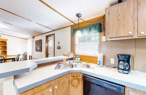 Saluda House | Lakefront home with deck, grill, boat ramp & dock - snowbird-friendly