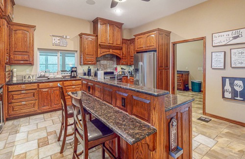 Rambo Riviera House | Lakefront home with hot tub, firepit, washer/dryer, kayaks, & hammocks