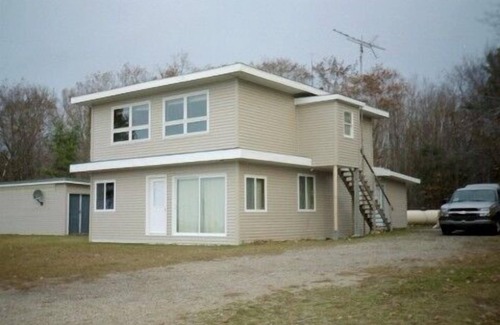 Brevort House | Lakefront Home with Spectacular View