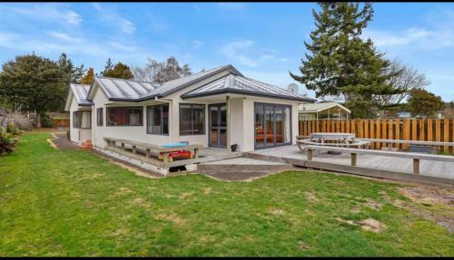 Waitahanui House | Lakefront House Stunning Sunsets