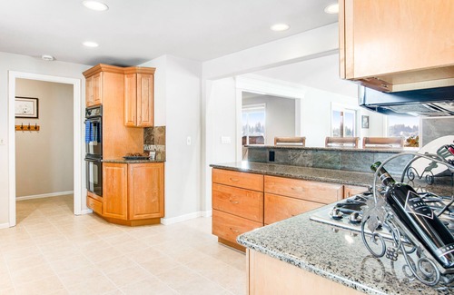 Bonney Lake House | Lakefront house with built-in bar & grill, fireplace, beach, & dock