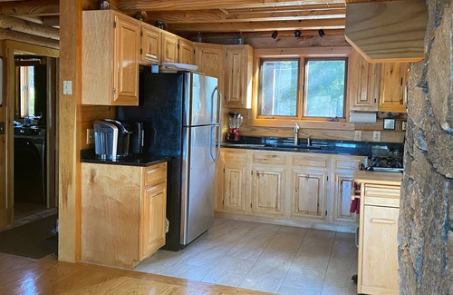 Bridgton Cabin | Lakefront Log Home 12 feet Away from Lake
