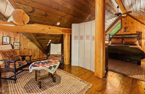 Tazewell House | Lakefront log home with private dock and cove