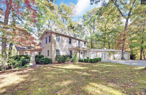 Cedar Cliff House | Lakefront property: amazing view of lake and mountains, EV charger, Private dock