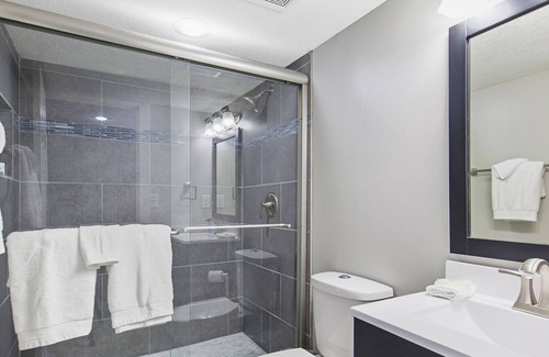 Barnett House | Lakefront retreat with a private dock, furnished patio & washer/dryer