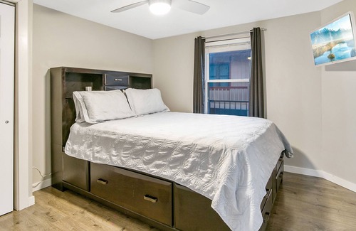 Barnett House | Lakefront retreat with a private dock, furnished patio & washer/dryer