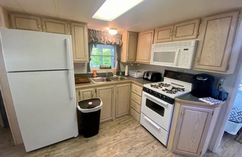 North Sebago Cottage | Lakefront Sebago cottage with dock, pet friendly