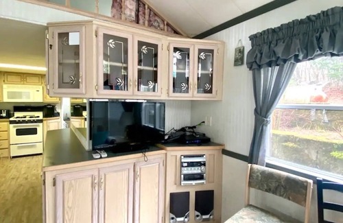 North Sebago Cottage | Lakefront Sebago cottage with dock, pet friendly