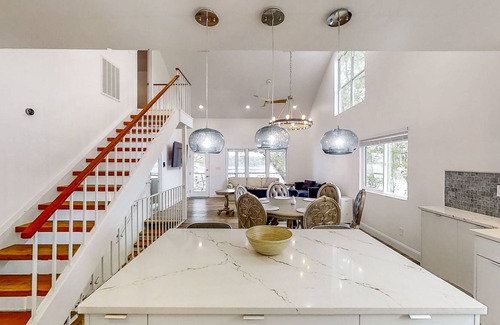 Telogia House | Lakefront stunner with large screened-in porch