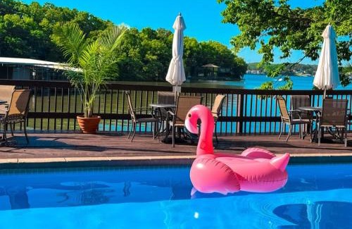 Village of Four Seasons House | Lakefront Treetop Village 2bd3badeckpool-6pp