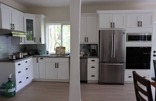 Seguin House | Lakeside Family Retreat | Game Room, Basketball, Kayaks, Private Beach, & More!