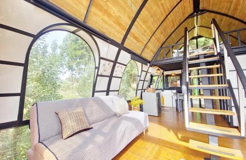 Guarne House | Lakeside Glamping with View Fire Pit Hammock