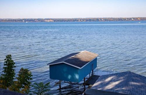 Geneva House | Lakeside Landing Dock Fire Pit and Boat Rental