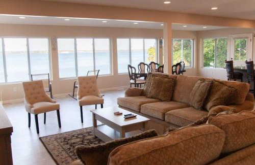 Geneva House | Lakeside Landing Dock Fire Pit and Boat Rental