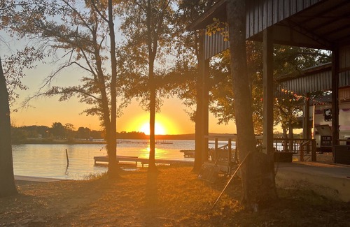 Lincoln House | Lakeside Luxury: Covered RV Site with Upgraded Patio and Private Pier