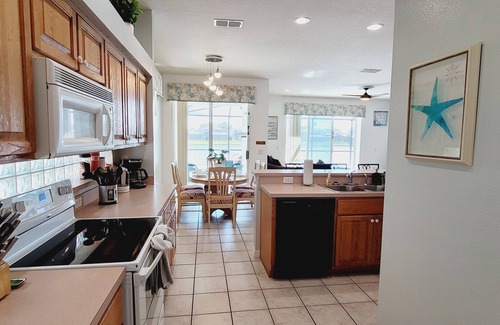 Sunset Lakes House | Lakeside Villa w/Sunny Private Pool Deck, Very close to theme parks/restaurants