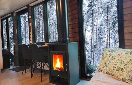Kolari Ski Chalet | Lapland Riverside Cabin 7 PUOLUKKA, Ylläs, Tiny Home with Sauna, Fireplace, Terrace, BBQ, Wifi, Ski, Fishing, Pets OK