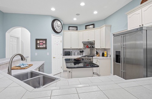 Ridgewood Lakes House | Large 4/5 bedroom private screened pool home on quiet street not overlooked