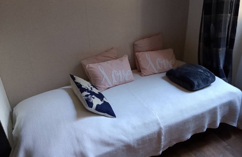 Lezat-sur-Leze Bed & Breakfast | Large bedroom (3 + 1 baby) & Dining area in a country village -