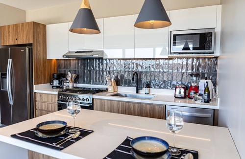 El Caloso Condo | Large Corner Balcony | Bar, Gym, in Romantic Zone