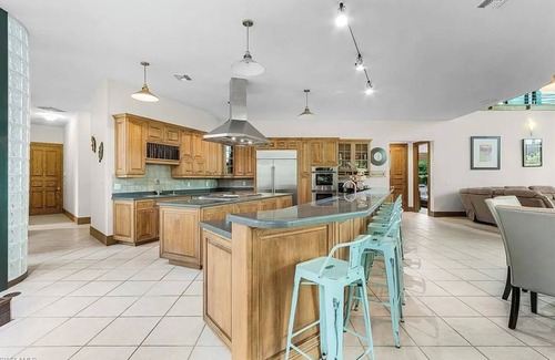 Burnt Store Marina Villa | Large Family Getaway-Unique Indoor Oasis w/heated pool, hot tub, pool table!